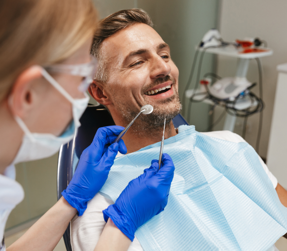 Man getting dental services