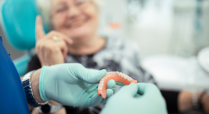 dentures being examined by dentist